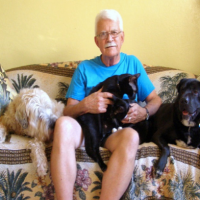 Don at home with (L-R) Molly, Trixie, 
Merlin and Dreyfus.